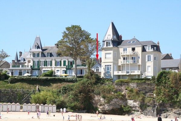 Just cross the street and descend the stairs and your on the beach. 