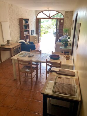 Main living area with double doors to garden, pool and terrace. 