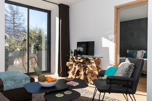 Large glass doors onto terrace   