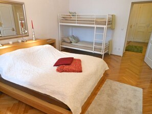 A double bed for 2 with size 180cm x 200cm. The bunk bed for 2 is 90cm x 200cm