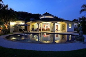 Front view of your villa at sunset.