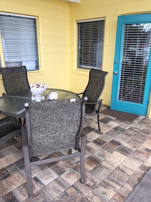 Listen to the waves as you drink coffee on the screened in porch.