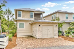 Back of the Home w/ one car garage