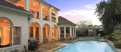 Pool area,comfortable patio seating and TV ( pool not heated)