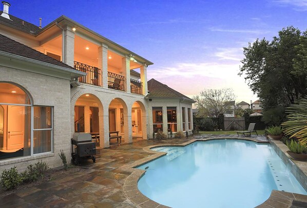 Pool area,comfortable  patio seating and TV  ( pool not heated)