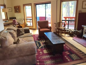 Bright living room with wood burning stove