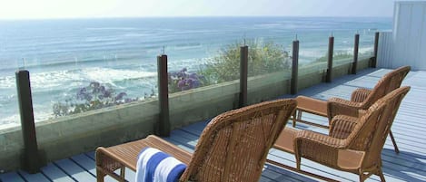 Oceanfront relaxing chaise lounges