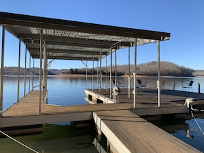 New added covered slip dock. Summer depth off front of dock is 17 feet.