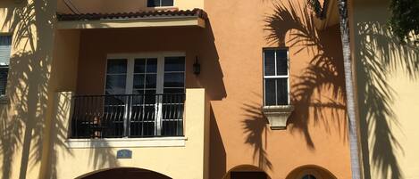 Beautiful arched entry-way with Parking for 2 and One Car Garage