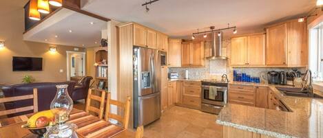 spacious kitchen and dining area