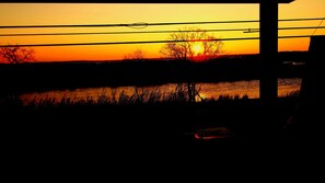 View of sunrise from front door.