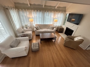 The living area includes comfortable seating for all our guests.