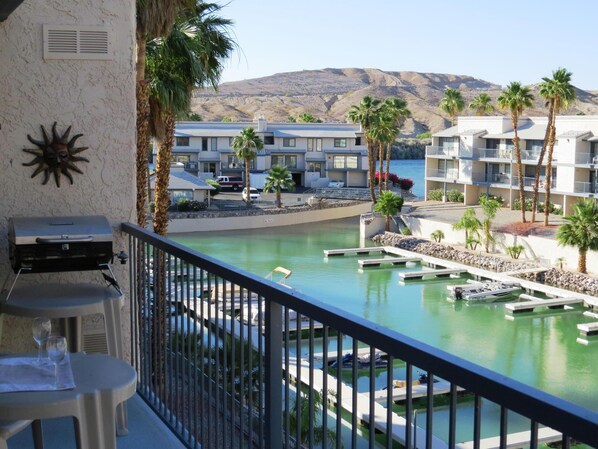 View of the marina and river from the large balcony.  Enjoy the view.