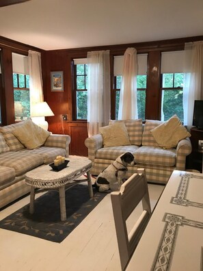 Another view of the living room and dining area
