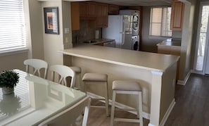 Dining table for 6 plus 3 counter stools - ready for your family dining!