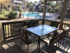 Back deck is covered with seating for 6 (cushions were updated to blue in Dec.)