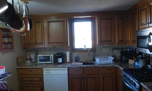 Kitchen with new granite couters