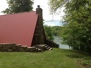 Front of cabin with inviting view of the lake!