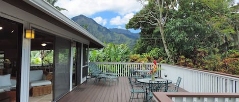 Comfortable tropical living inside and out with great ocean and mountain views