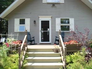 Enjoy your cup of coffee in the morning sun on the front porch!