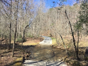 crossing McClure Creek at entrance to road
