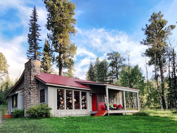 Exterior of cabin. No neighbors as far as the eye can see. 