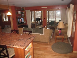 Relax in the family room or in the screened in porch!