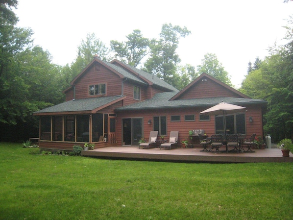 Enjoy the large backyard. The hot tub is just around the corner!