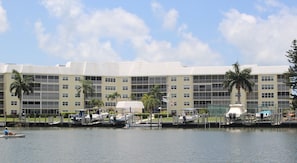 WAter view with floating dock for long board and kayak launching.