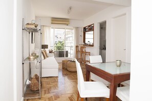 Natural light and an open view highlight the dining and living room.