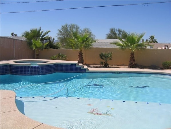 Custom pool w/ 12' beach entrance & umbrella holders for small children to enjoy