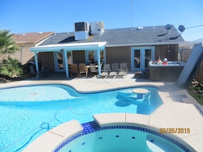 Beautiful backyard with huge pool, patio set, grill, & hot tub *Pool not heated