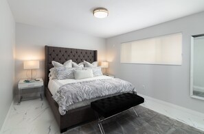 Master Bedroom Features a King Size Hilton Dream Bed