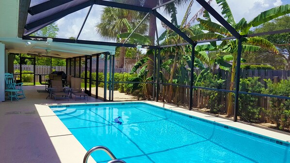 Well maintained, huge, screened-in pool. Pool heater for year-round swimming
