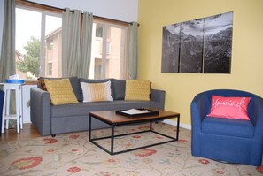 The sofa transforms into a bed and the chairs swivel.