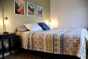 The main bedroom has a comfortable king size bed. 
