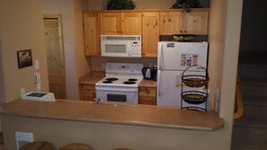 Kitchen with eating bar.