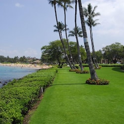 Impeccable grounds with manicured lawn.