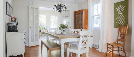 Dining room Table seats 8.
More seating with TV tables and adjacent living room.