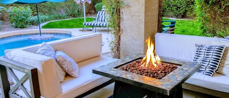 Enjoy the cooler evenings in front of the fire pit, in your private resort!