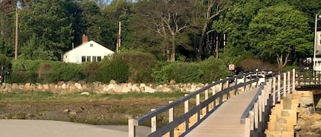 You're on Good Harbor Beach, at the end of the bridge, looking back to the house