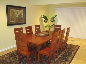 Dining Room with 8ft sliding glass door to deck & waterfront views of canal