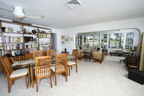 Looking from the front door through the dining room, living room, to the water