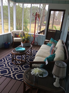 Very comfortable  seating on  screen porch with lake view