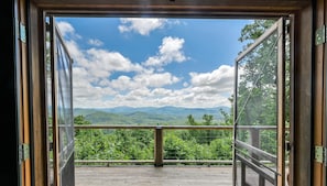 Open the french doors to a breathtaking valley and mountain view!