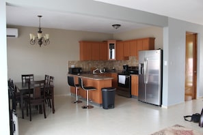 Kitchen with island and dinning area.