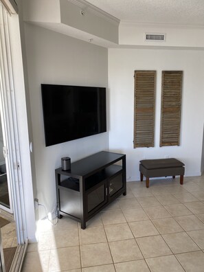 65” Smart Tv in living room - enjoy your favorite programming and the views!