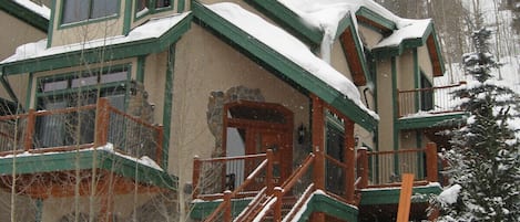 Ski-in at end of day to this beautiful mountain home on a quiet wooded street