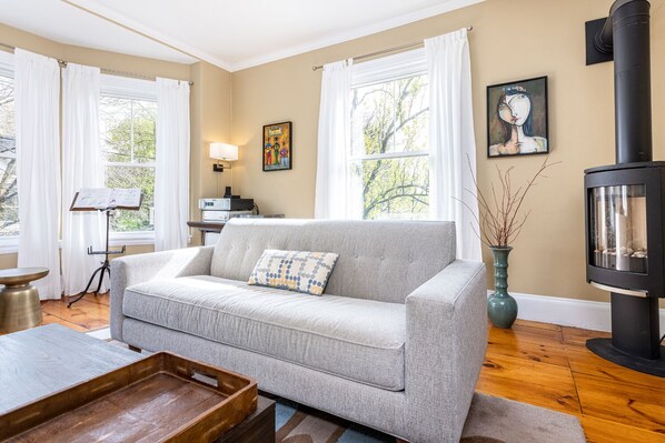 Living room has gas fireplace, located on 2nd fl