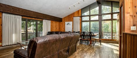 Hardwood floors & large windows provide a little more luxury in the wilderness.